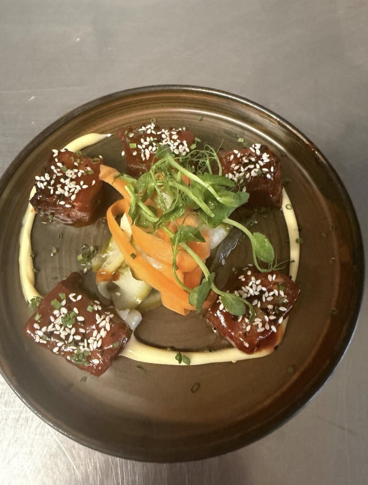 Korean BBQ pork belly bites with sesame and pickled veg